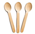 Three wooden spoons on a white background