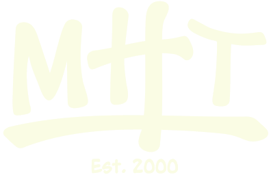 Handwritten-style text 'MHT' in light yellow on a white background