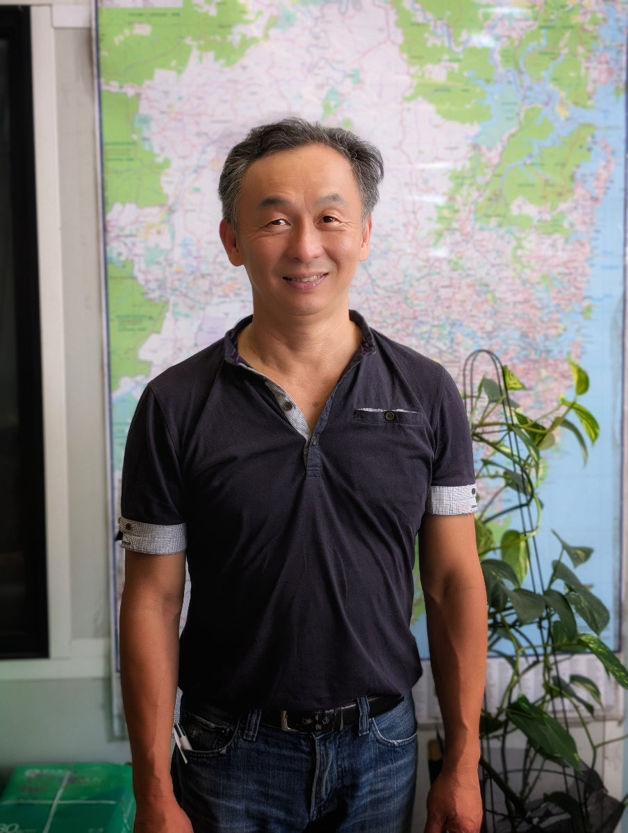 Man standing in front of a NSW map